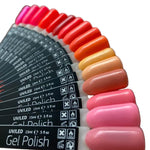Color swatch of gel nail polishes with a gradient from pink to red on a white background.